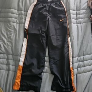 Nike Kids Black, White, and Orange Jogger Track Pants Size 10/12